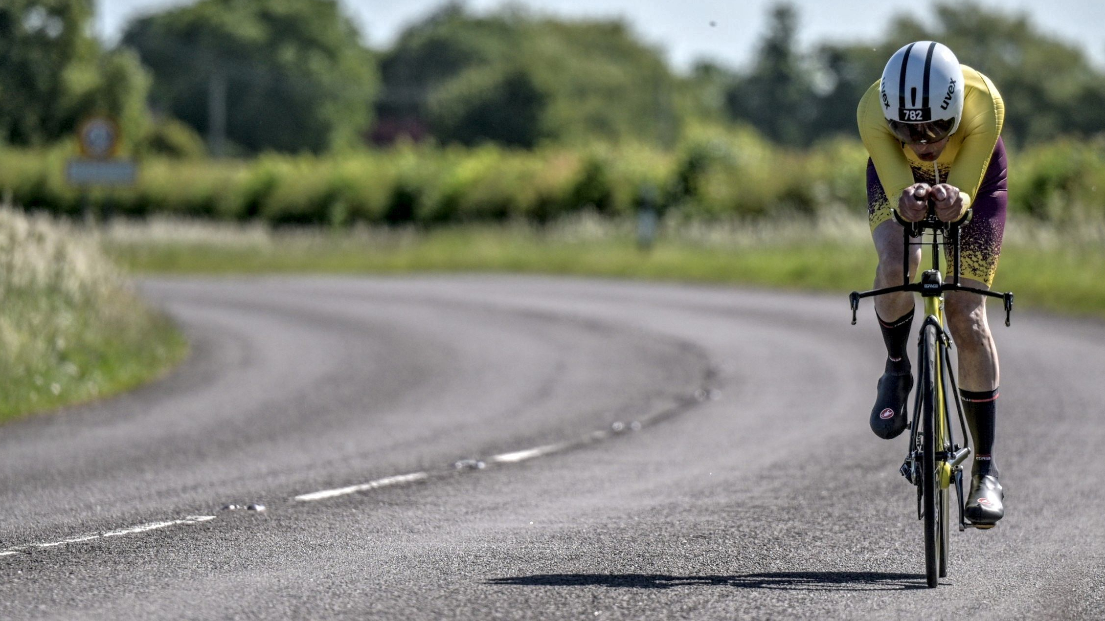 Cambridge Chrono P3C with custom paint job, NoPinz Flow skin suit in FloatAero Race Team livery. UCI complient front end with a high stack and a bridge peace for stability.